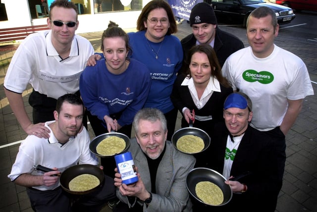The teams taking part in the Pancake Race on Beulah Street in Harrogate. Pictured with Mike Beardsley of Sight Savers (centre) are Greg Dimond, Royston Bayfield, Lynne Yeadon, Andrea Day, Christine Jackson, Scott Lawson, John Broadberry and Robert May.
