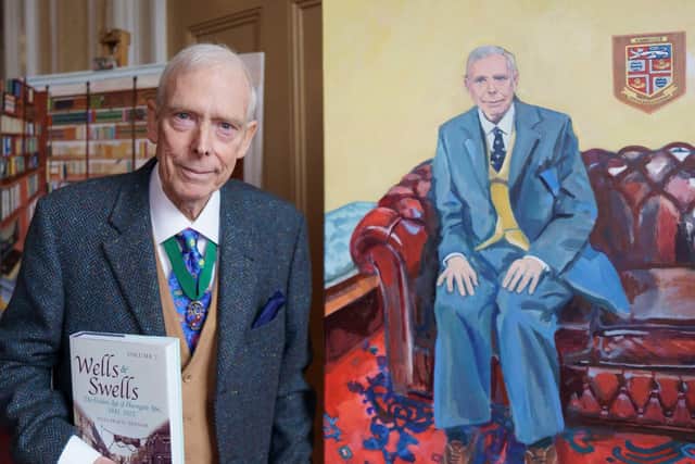 Harrogate historian Malcolm Neesam pictured with his new book and new portrait at the launch of Wells & Swells at Cedar Court Hotel.