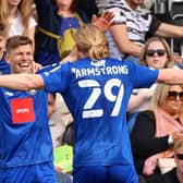 Lloyd Kerry is congratulated by his Harrogate Town team-mates after firing the visitors into a 3-1 lead at Forest Green Rovers. Pictures: Matt Kirkham