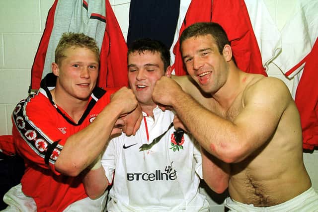 Martyn Wood, centre, pictured with England team-mate Josh Lewsey, left, and Joe Worsley in 2001. Picture: Getty Images