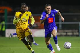 Harrogate Town left-back Lewis Page in EFL Trophy action against Sutton United earlier this season. Pictures: Matt Kirkham