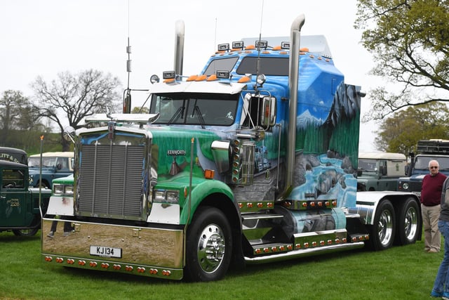 A custom painted Kenworth monster truck on display at the show