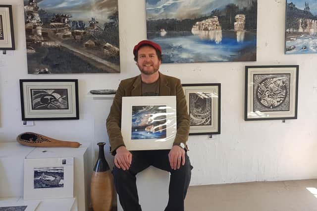 Artist/musician Paul Mirfin at Art in the Mill gallery in Knaresborough.