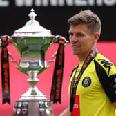 Lloyd Kerry at Wembley Stadium with the 2019/20 National League play-off final winners' trophy. Picture: Getty Images
