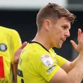 Lloyd Kerry leaves the pitch for the final time as a Harrogate Town player. Pictures: Matt Kirkham