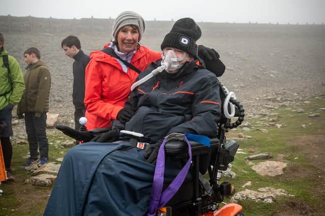Ian Flatt, 56, who has terminal motor neurone disease (MND) and needs a ventilator for 16 hours a day, is scaling Snowdon’s 1085 metres in his off-road wheelchair to raise funds for Leeds Hospitals Charity’s appeal to build a new Rob Burrow Centre for Motor Neurone Disease for Leeds Teaching Hospitals NHS Trust, also pictured with his mum Terry Flatt.