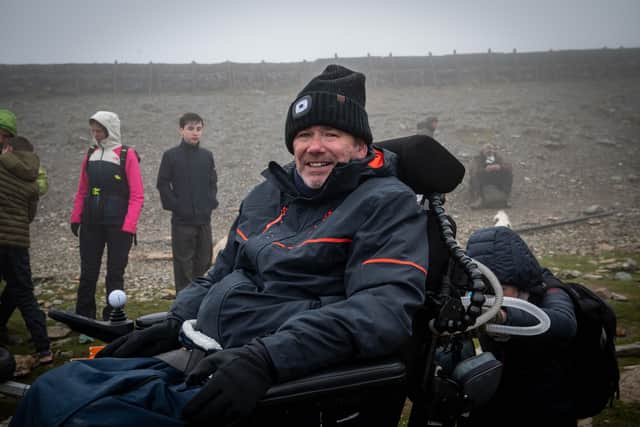 Ian Flatt, 56, who has motor neurone disease (MND) and needs a ventilator for 16 hours a day, during the Snowdon climb to raise funds for Leeds Hospitals Charity’s appeal to build a new Rob Burrow Centre for Motor Neurone Disease for Leeds Teaching Hospitals NHS Trust.
