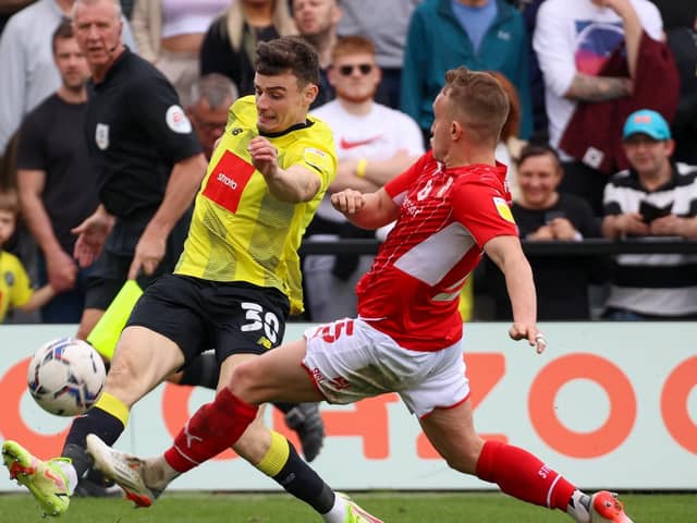 Harrogate Town winger Simon Power in action against Swindon. Pictures: Matt Kirkham