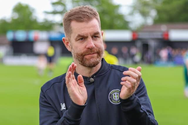 Simon Weaver applauds Harrogate Town's supporters following the club's final game of the season, a 2-0 home defeat to Sutton United. Pictures: Matt Kirkham