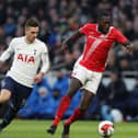 Toumani Diagouraga in FA Cup action for Morecambe against Tottenham Hotspur earlier this season. Pictures: Getty Images