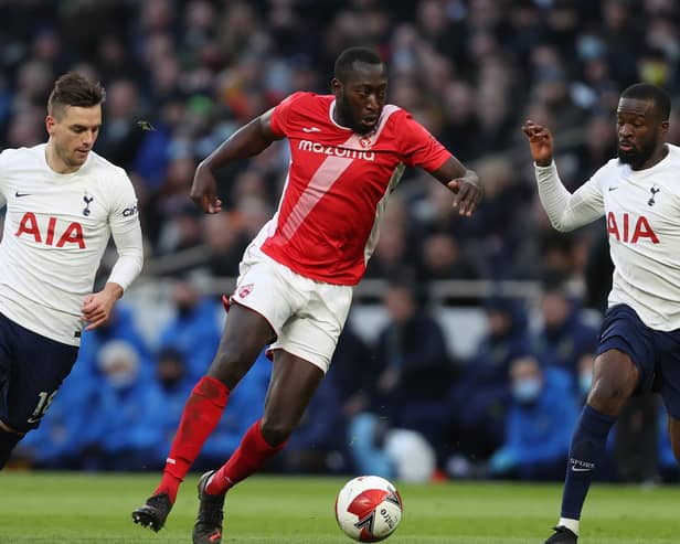 Toumani Diagouraga in FA Cup action for Morecambe against Tottenham Hotspur earlier this season. Pictures: Getty Images
