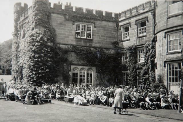 Harrogate  Ladies College pupils who were evacuated  during the war to Swinton Park at Masham outside the building in 1945