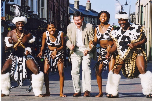 Peter Morrill, Chief Executive of Atmos, gets into the rhythm with Imbongi, who performed at the Harrogate Theatre as part of the Harrogate International Festival.