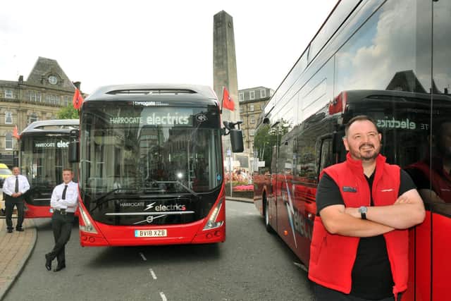 Committed to better buses for passengers - Alex Hornby, chief executive officer of Harrogate Bus Company (Transdev Blazefield) with part of his electric fleet.