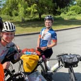 Harrogate's Andy Dennis and his partner Tracey Hill bump into a cyclist in France this week during the first week of their epic Ride the Rock charity ride.