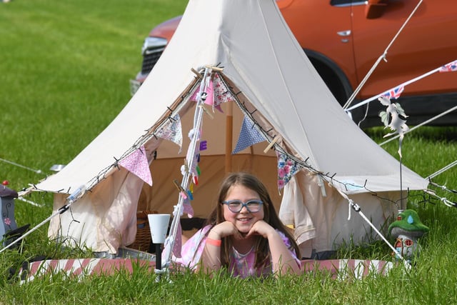 Millie Bottomley (aged eight) in her miniature bell tent