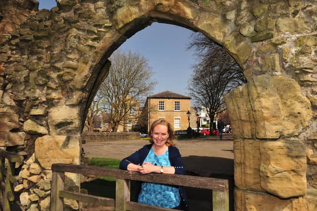 Kathy Allday outside Knaresborough Castle with Castle Girls School in the background Picture Gerard Binks