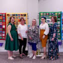 Harrogate Scrubbers celebrations at the Pavilions of Harrogate -  Pictured with the Harrogate Scrubbers quilts are, from left,  Fran Taylor, Claire Strachan, Pam Mullins, Elise Madolyn Johnson, Lisa Sumpton. Picture Gerard Binks