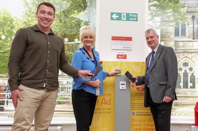 Harrogate BID Manager Matthew Chapman, HSBC Senior Network Manager Linda Lewis, and Harrogate Borough Council’s Cabinet Member for Housing and Safe Communities Coun Mike Chambers.