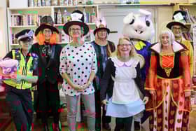 WiSE volunteers at a recenty Mad Hatter's Tea Party for the elderly.