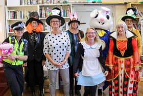 WiSE volunteers at a recenty Mad Hatter's Tea Party for the elderly.