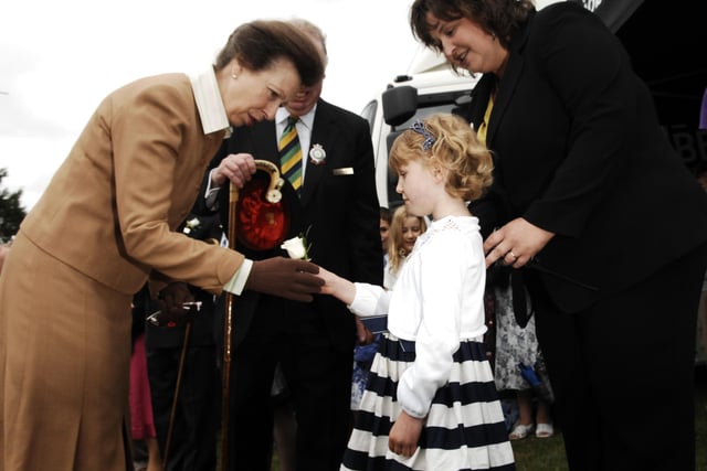 Princess Anne is given a flower by five-year-old Rowan Krier from Ripon at the Great Yorkshire Show.