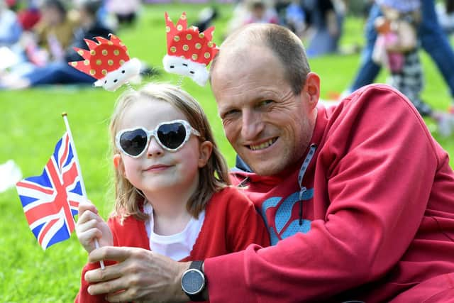 Penelope Forrest (aged five) and Simon Forrest amongst the picnics in the Jubilee Square on the West Park Stray