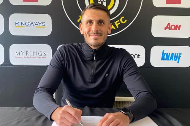 Pete Jameson put pen to paper on a contract with Harrogate Town to become the club's first new signing of the summer. Picture: Harrogate Town AFC