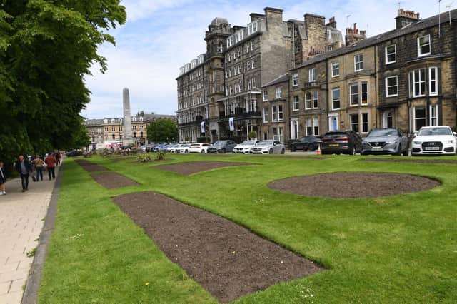 The empty flower beds are situated outside the Alexandra pub and The Yorkshire Hotel, opposite where the 'Jubilee Square' has been erected on the Stray.
