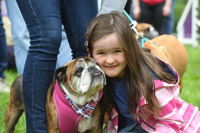 Seven-year-old Florence Kelly with Tiggy the British Bull Dog.