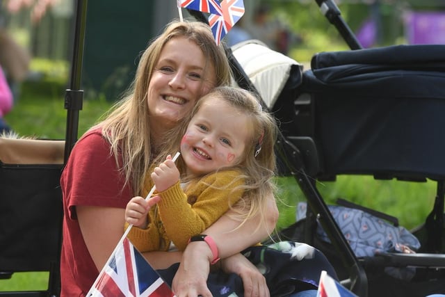Gemma Kell and her three-year-old daughter Elsie Kell-Summers are pictured watching the Trooping the Colour at Jubilee Square,