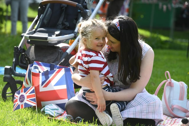 Maddy Burton-Cole with her son three-year-old Alfie, watching the Trooping the Colour in amongst the picnics in the Jubilee Square.