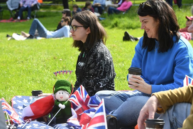 These visitors to the picnic in the park at the Jubilee Square brought along their own guest of honour... the Queen, herself.