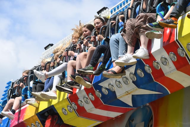 Fairground rides in Valley Gardens to entertain the crowds.