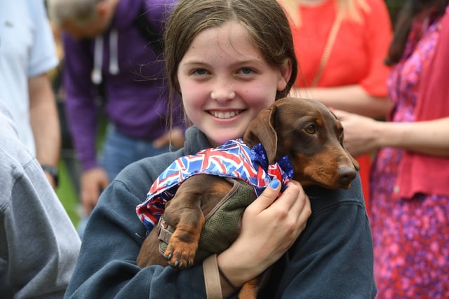 Lousia Stokes with Errol the Dachshund taking part in the Dog Show on the West Park Stray
