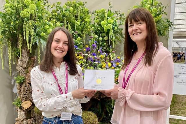 Helen James Florists owner Helen Pannitt and her daughter Laura with the Silver gilt medal at the RHS Chelsea Flower Show.