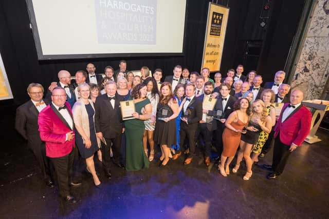 Winners pose with their awards at the end of the 2022 Harrogate Hospitality and Tourism Awards with hosts Simon Cotton and David Ritson