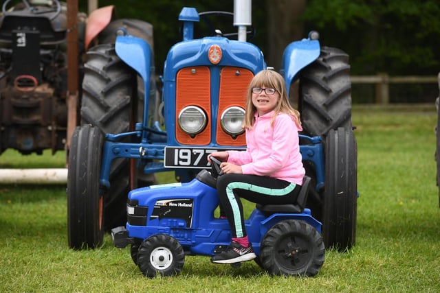 Sophia Tiplady (aged seven) playing on the toy tractors