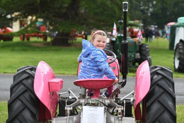 Daisy Steer (aged four) on a pink Fergie tractor at the show