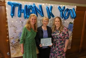 Lynda Parker (centre) who has been with Continued Care for 22 years, with Director Samantha Harrison (left) and Registered Manager Tanya Lowe (right)