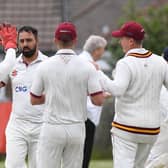 Tuseif Arshad is congratulated by his Bilton CC team-mates after taking a wicket during Saturday's derby success over Beckwithshaw. Pictures: Gerard Binks