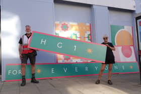 Harrogate BID Street Ranger Chris Ashby and Harrogate BID Project Lead Jo Caswell with the ‘HG1 for Everyone’ graphics at the ex-Post Office on Cambridge Road.