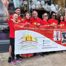 The Westrow Hairdressing Group walkers celebrate at the finish line in Harrogate