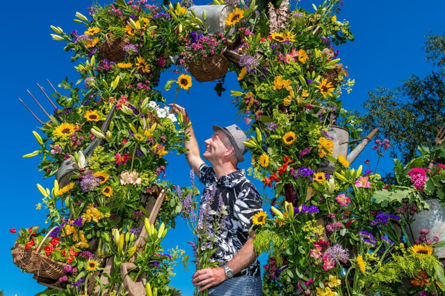 TV Presenter and Floral Designer, Jonathan Moseley, putting the finishing touches to his floral display