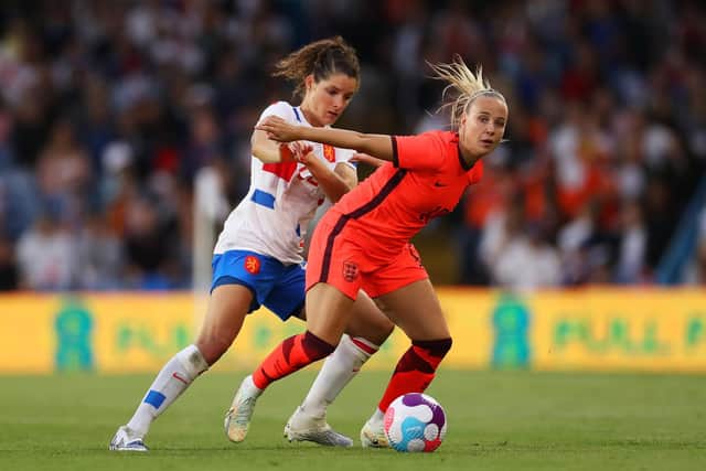 Dominique Janssen of Netherlands challenges Beth Mead of England during the Women's International friendly between England and Netherlands at Elland Road on June 24, 2022 in Leeds. (Photo by Lewis Storey/Getty Images)