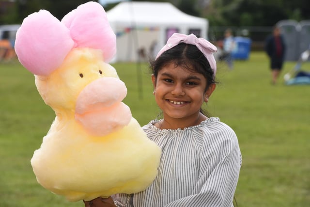 Sukhmani Kaur (aged nine) with her giant candy floss duckling