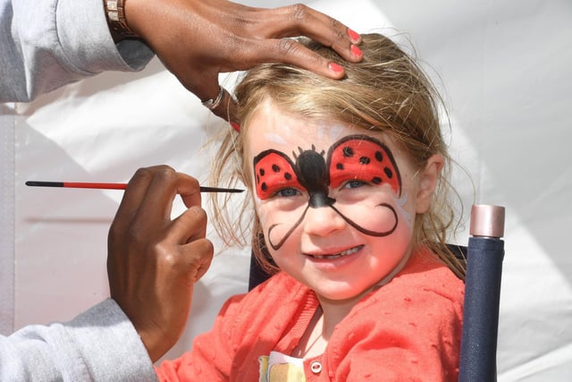 Olivia Molyneux (aged six) getting her face painted at the festival