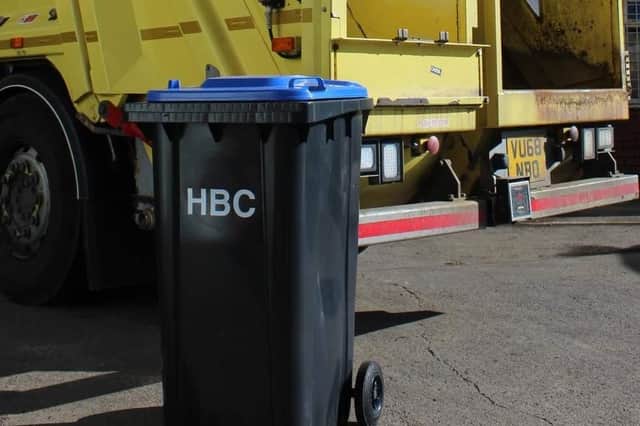 The blue-lidded wheelie bins are being trialled as a replacement for black recycling boxes.