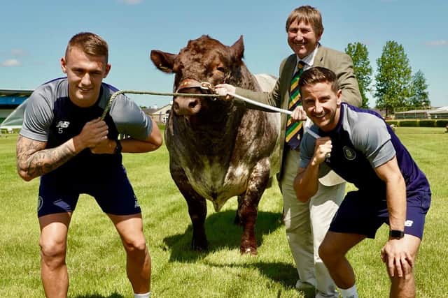 Harrogate Town AFC players Josh Falkingham and Will Smith with Director of the Great Yorkshire Show Charles Mills