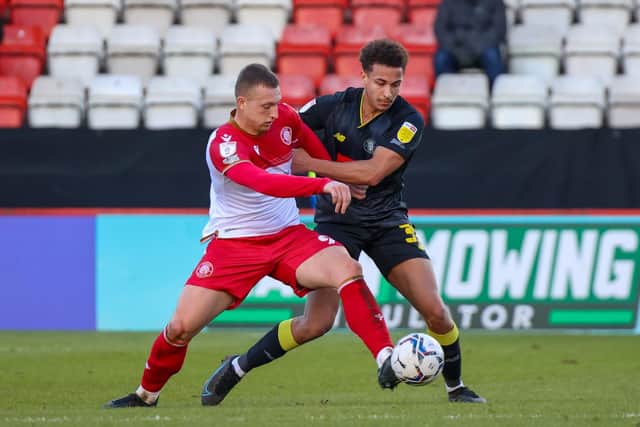 Lewis Richards in action for Harrogate Town away at Stevenage.